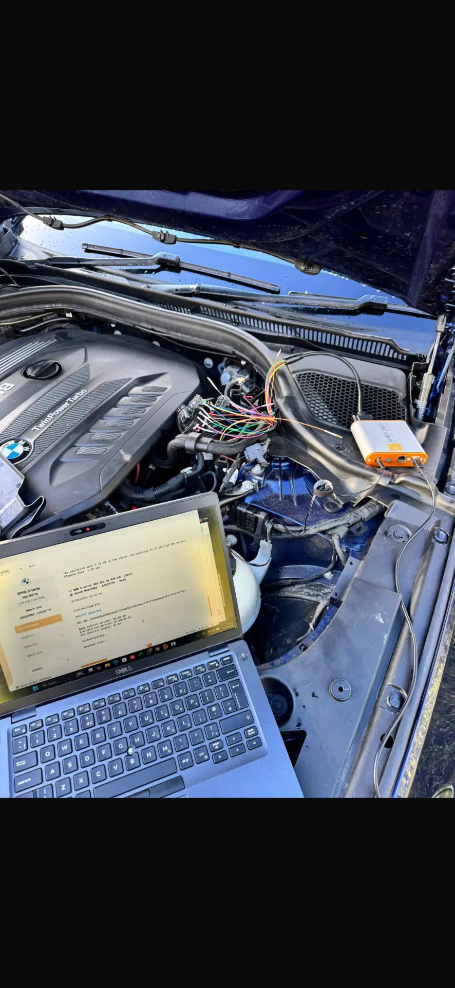 Customer-supplied photo of PWR Remaps ECU equipment connected in a BMW engine bay